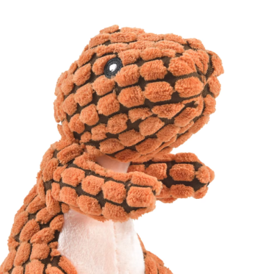 Peluche pour chien en forme de dinosaure. Petit plus car il ressemble à salamèche.